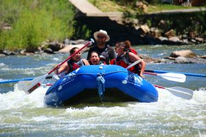 a group of people rafting with pagosa adventure in pagosa springs, colorado
