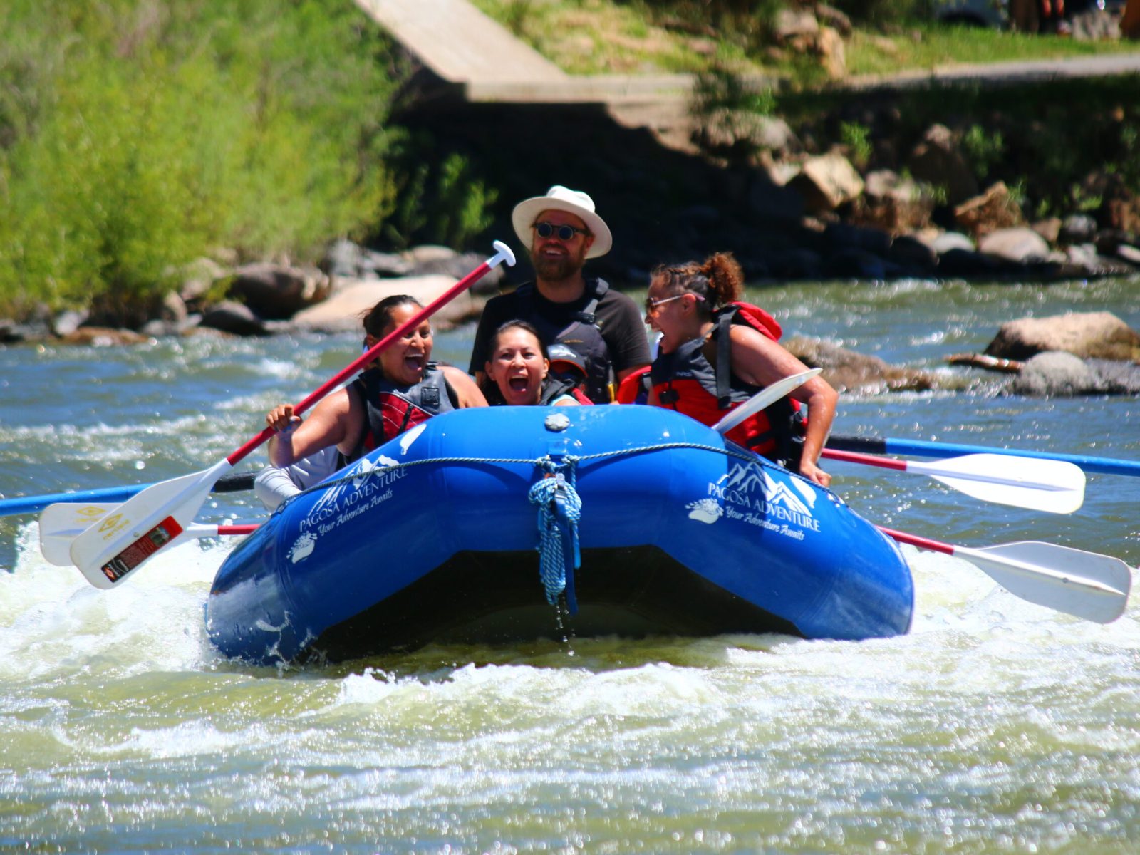 a group of people rafting with pagosa adventure in pagosa springs, colorado