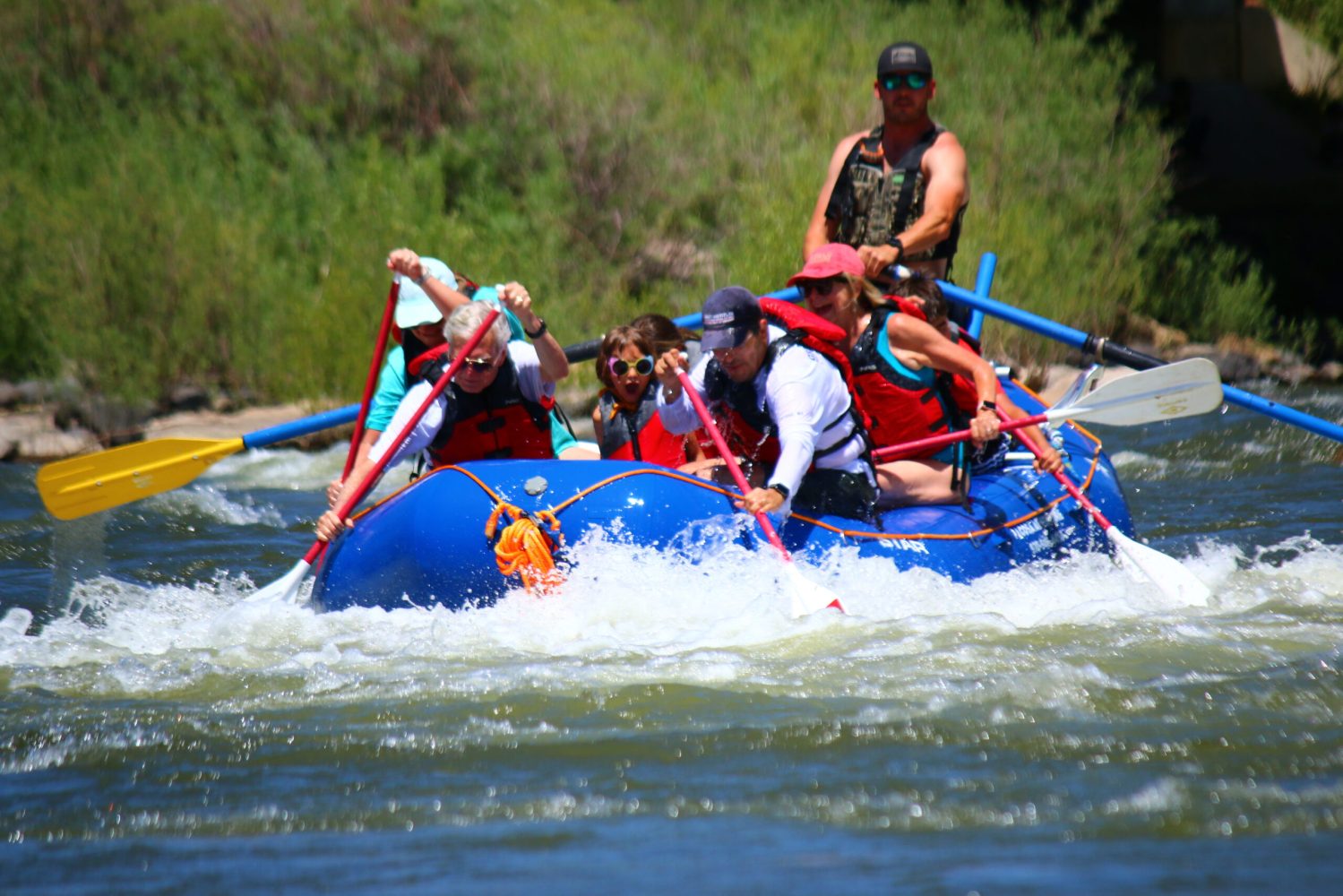 a group of people rafting with pagosa adventure in pagosa springs, colorado