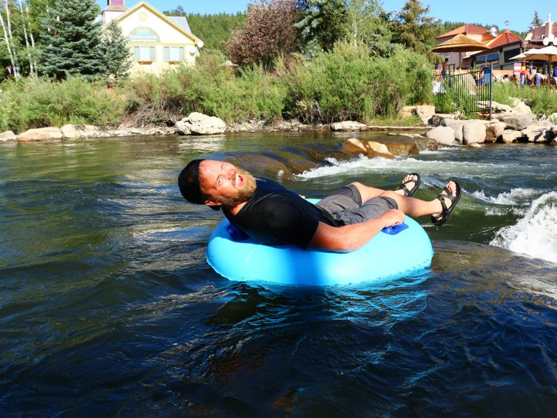 a man tubing on a The San Juan River in Pagosa Springs, Colorado, With Pagosa Adventure in pagosa springs, colorado