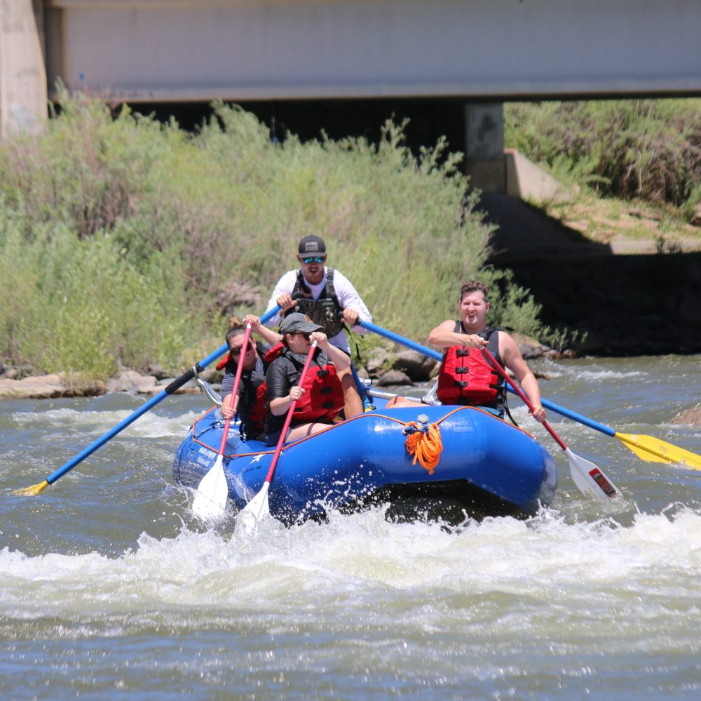 a group of people rafting with pagosa adventure in pagosa springs, colorado