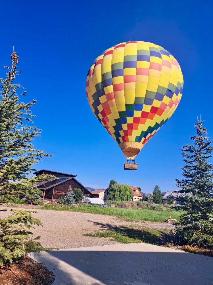 a balloon on the side of a road