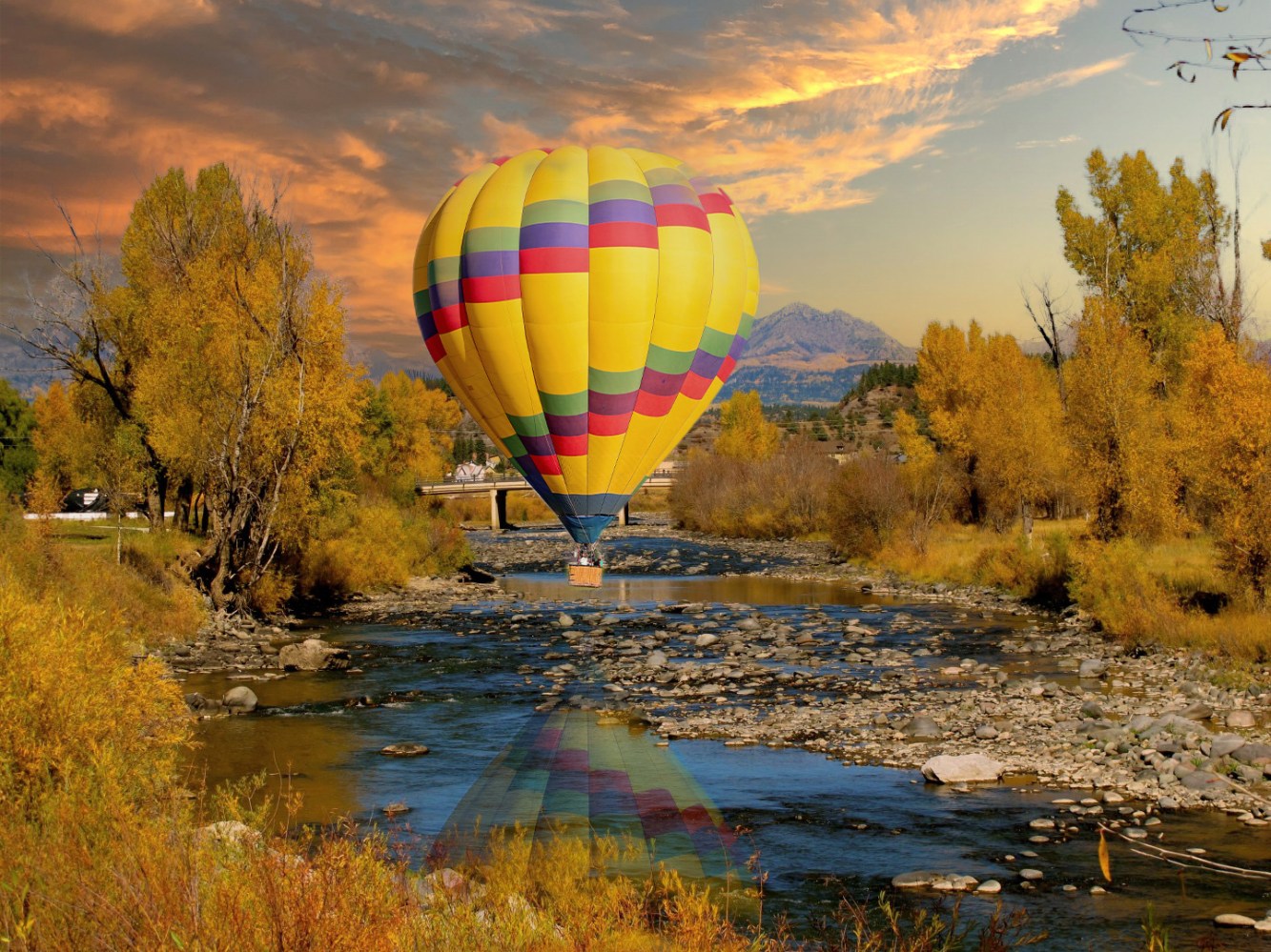 a colorful kite flying in the sky