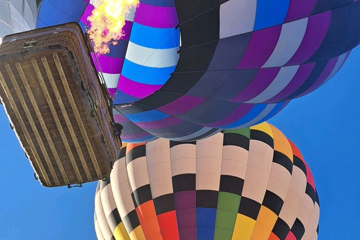 a colorful hot air balloon in the sky