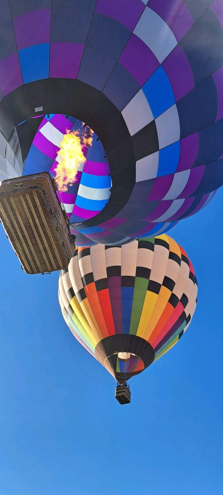 a colorful hot air balloon in the sky