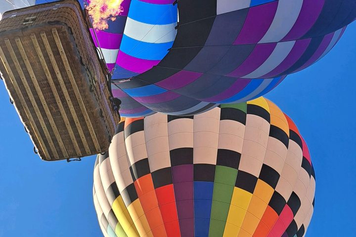 a colorful hot air balloon in the sky