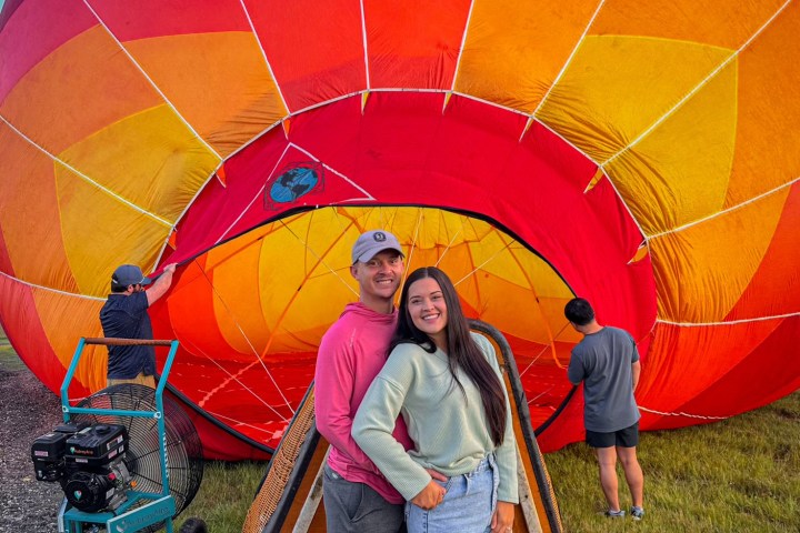 Kerry Harvey holding a colorful umbrella