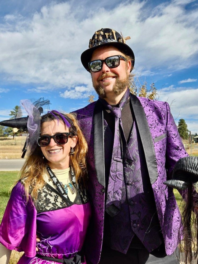 a man and a woman posing for a picture