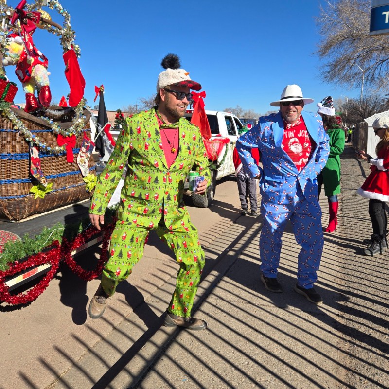 a group of people walking up a hill