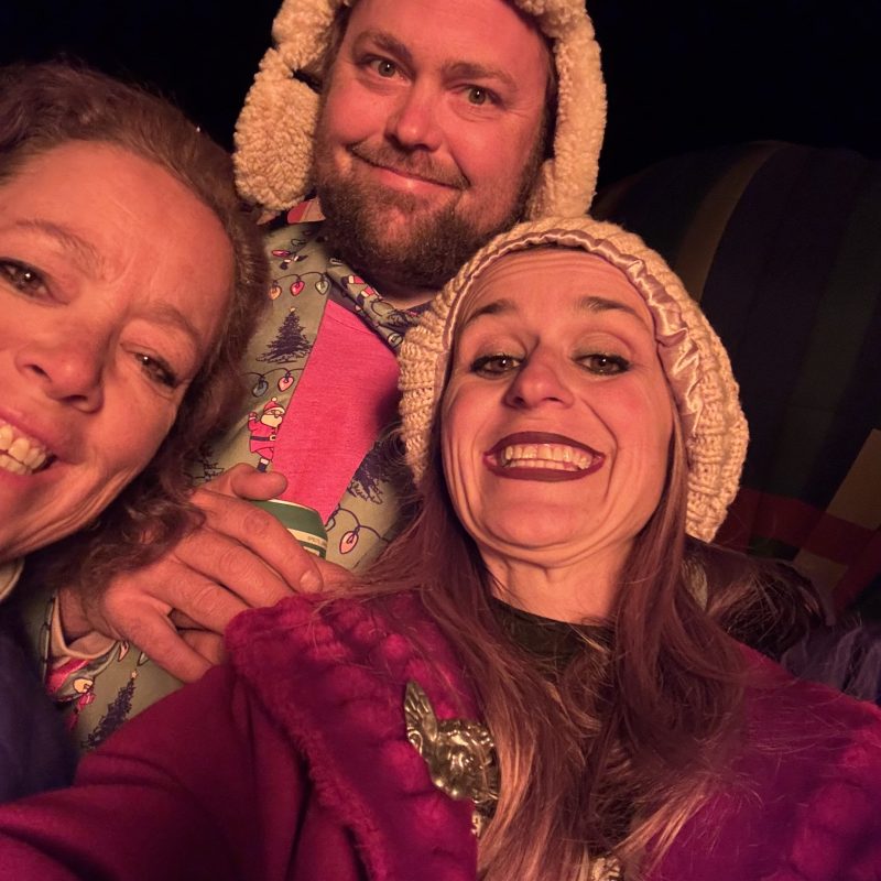 a man and a woman smiling for the camera