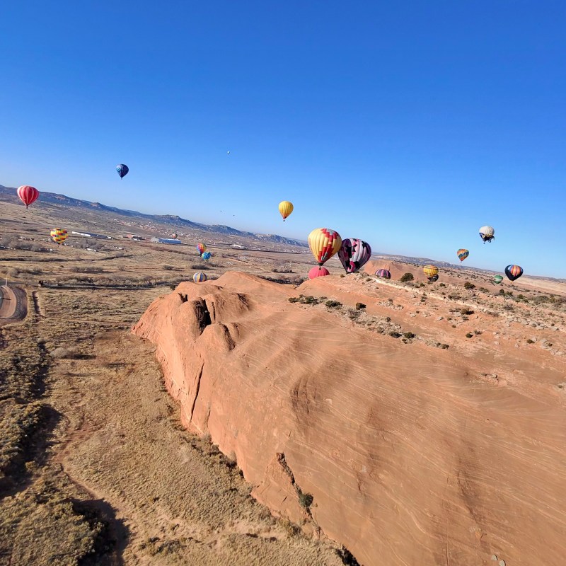 a group of people in a desert